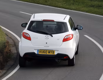 Mazda2 5-door [UK-spec] (DE2) '2010–14
