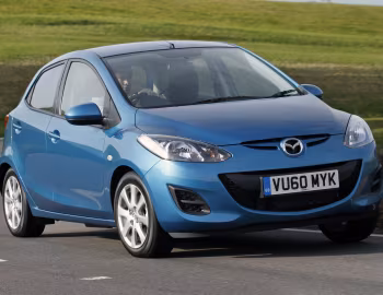 Mazda2 5-door [UK-spec] (DE2) '2010–14