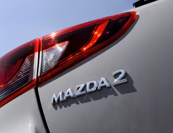 Mazda2 Homura Aka [UK-spec] (DJ) '2023–25