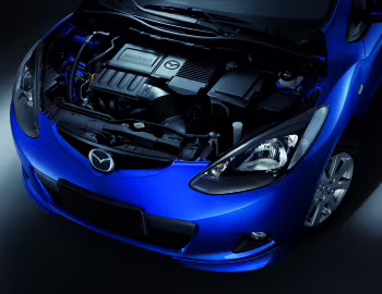 Bajo el capó Mazda2 Sedan (DE) '2008–10