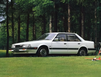 Mazda Capella 1.8 SG-X Extra Sedan (GC) '1986–87