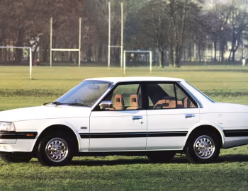 Mazda Capella 1.8 SG-X Extra Sedan (GC) '1986–87