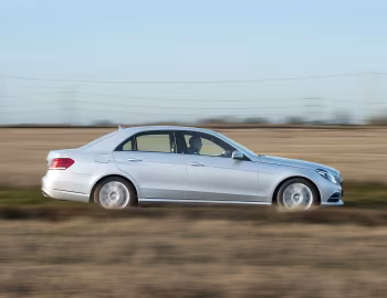 Mercedes-Benz E 300 BlueTec Hybrid [UK-spec] (W212) '2013–16