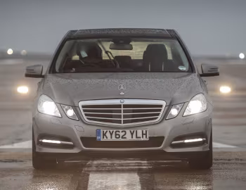 Mercedes-Benz E 300 BlueTec Hybrid [UK-spec] (W212) '2010–12