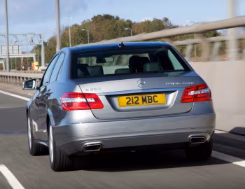 Mercedes-Benz E 300 BlueTec Hybrid [UK-spec] (W212) '2010–12