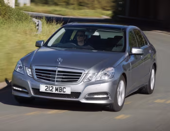 Mercedes-Benz E 300 BlueTec Hybrid [UK-spec] (W212) '2010–12