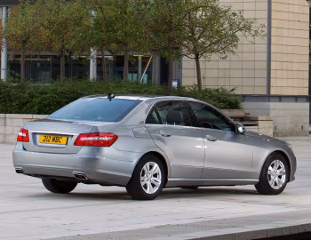 Mercedes-Benz E 300 BlueTec Hybrid [UK-spec] (W212) '2010–12