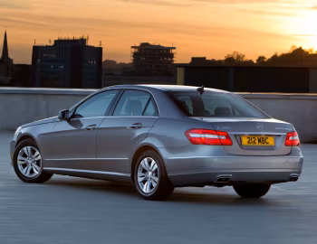 Mercedes-Benz E 300 BlueTec Hybrid [UK-spec] (W212) '2010–12