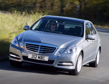 Mercedes-Benz E 300 BlueTec Hybrid [UK-spec] (W212) '2010–12