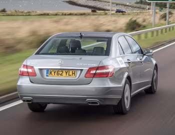 Mercedes-Benz E 300 BlueTec Hybrid [UK-spec] (W212) '2010–12