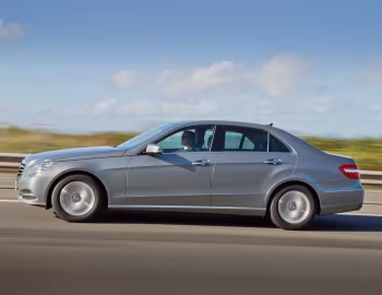 Mercedes-Benz E 300 BlueTec Hybrid [UK-spec] (W212) '2010–12