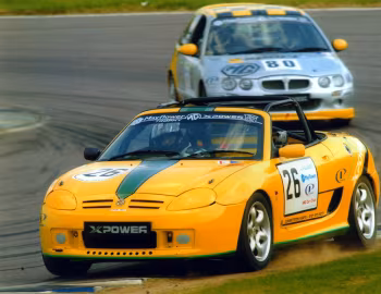 MG