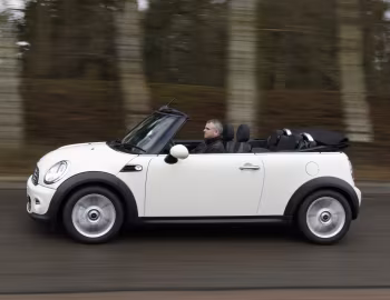 Mini One Cabrio [UK-spec] (R57) '2010–15