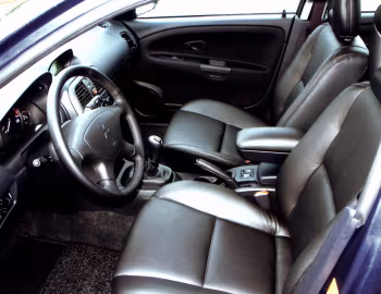 Интерьер Mitsubishi Carisma 5-door [Worldwide] (DA2A) '2002–04