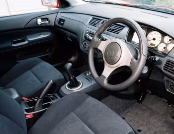Интерьер Mitsubishi Lancer [UK-spec] (CS0) '02.2003–01.2005