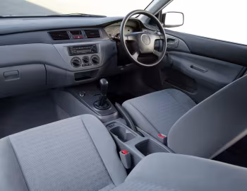 Интерьер Mitsubishi Lancer ES [Australia] '2003–06