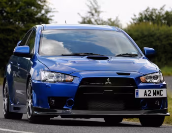 Mitsubishi Lancer Evolution X FQ-400 [UK-spec] '2009–16
