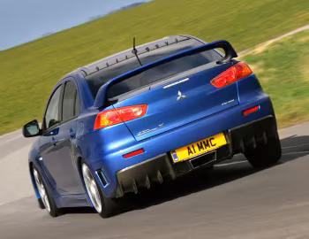 Mitsubishi Lancer Evolution X FQ-400 [UK-spec] '2009–16