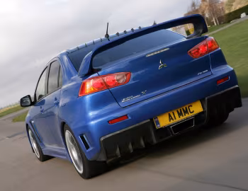 Mitsubishi Lancer Evolution X FQ-400 [UK-spec] '2009–16