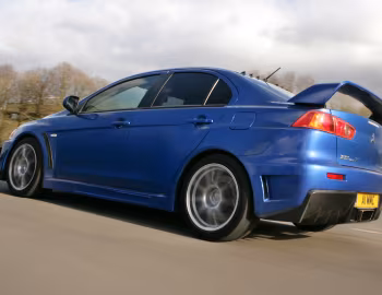 Mitsubishi Lancer Evolution X FQ-400 [UK-spec] '2009–16