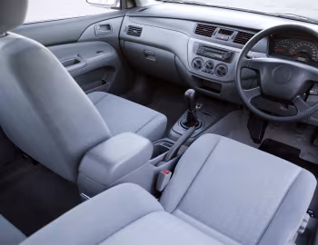 Интерьер Mitsubishi Lancer LS [Australia] '2003–05
