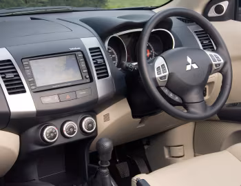 Тарпеда Mitsubishi Outlander [UK-spec] '2007–09