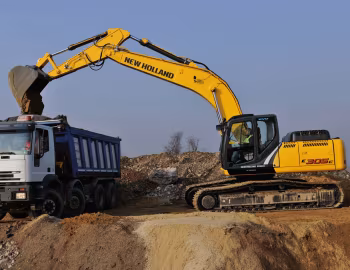 Iveco EuroTrakker 8×4 Tipper, New Holland E305C
