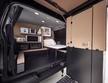Интерьер Nissan Caravan Disaster Support Mobile-Hub '01.2024