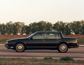1987 Oldsmobile Ninety-Eight Regency Brougham Sedan (3C W51)