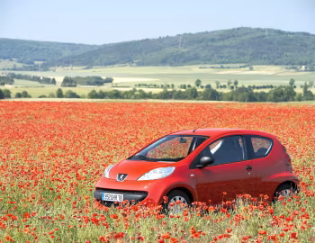 Peugeot 107 3-door "Rouge Scarlet" '2005–08