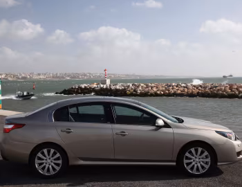 Renault Latitude [EU-spec] '2010–13