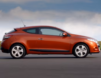 Renault Mégane Coupé [UK-spec] '2009–12