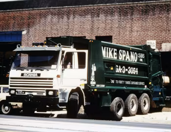 Scania P112H 8×4 with E-Z Pack Goliath GL-370 Refuse body [US-spec] '1984–????