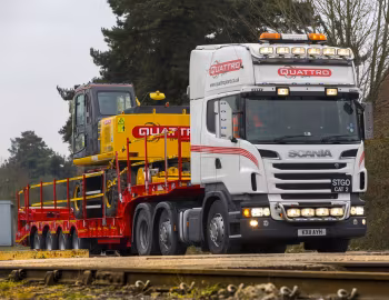 Scania R580 6×2 Topline, Komatsu PW