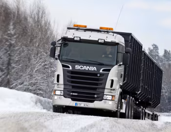 Scania R560 8×4 hooklift '2009–13