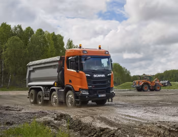 Doosan DL300-3, Scania R 500 XT 8×4 rigid CR17N with Meiller tipper body