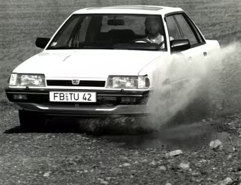 Subaru 1800 Sedan 4WD Turbo (AA) '1987–89
