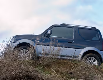Suzuki Jimny [UK-spec] (JB43) '2012–18