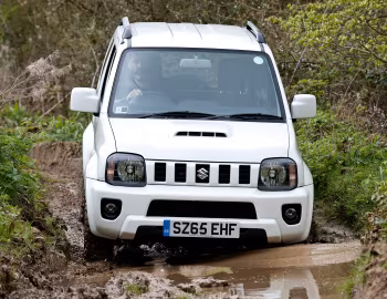 Suzuki Jimny [UK-spec] (JB43) '2012–18