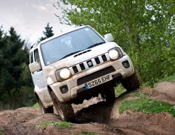 Suzuki Jimny [UK-spec] (JB43) '2012–18