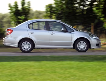 Suzuki SX4 Saloon [UK-spec] '2009–11