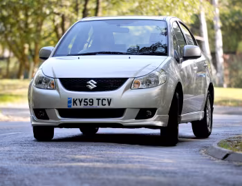 Suzuki SX4 Saloon [UK-spec] '2009–11
