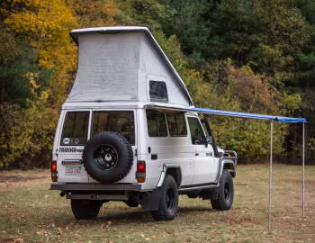 Toyota Land Cruiser Troop Carrier with Trakka Bushman Pop Top [Australia] (HJ75) '1985–????
