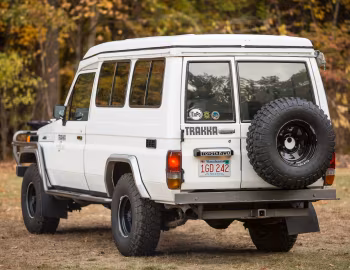 Toyota Land Cruiser Troop Carrier with Trakka Bushman Pop Top [Australia] (HJ75) '1985–????