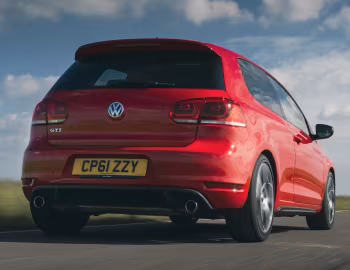 Volkswagen Golf GTI 3-door [UK-spec] (Typ 5K) '2009–13