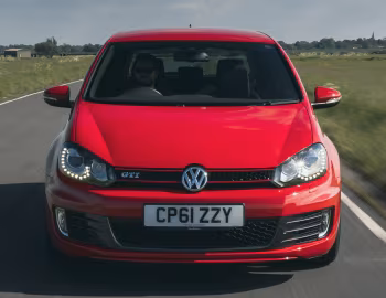 Volkswagen Golf GTI 3-door [UK-spec] (Typ 5K) '2009–13