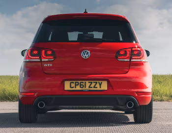Volkswagen Golf GTI 3-door [UK-spec] (Typ 5K) '2009–13