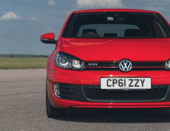 Volkswagen Golf GTI 3-door [UK-spec] (Typ 5K) '2009–13