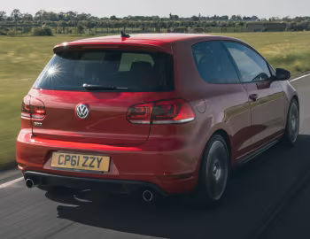 Volkswagen Golf GTI 3-door [UK-spec] (Typ 5K) '2009–13
