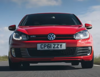 Volkswagen Golf GTI 3-door [UK-spec] (Typ 5K) '2009–13